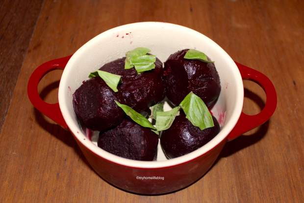 Cooked Beetroot with fresh Basil leaves